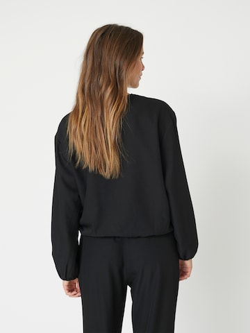 co'couture Välikausitakki 'Luna' värissä musta
