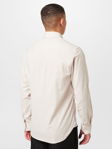 Clean Cut Copenhagen Regular fit Button Up Shirt in Beige