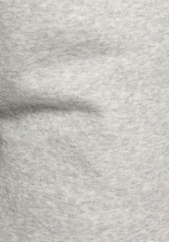 PUMA Regular Sporthose 'ESS+' in Grau