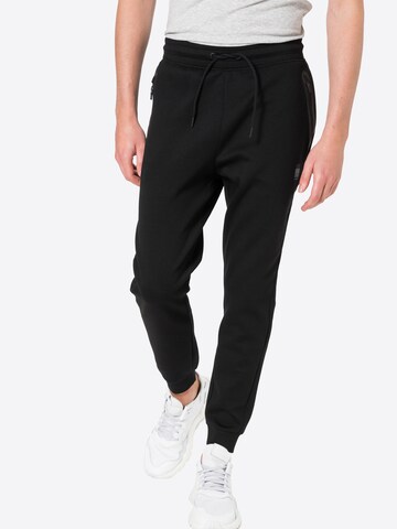 Tapered Pantaloni sport de la Superdry pe negru: față