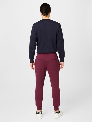 BJÖRN BORG Tapered Sportbroek 'CENTRE' in Lila