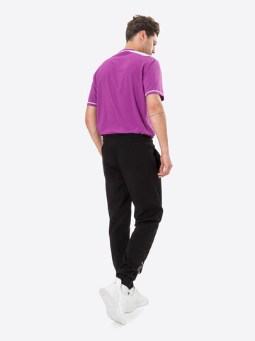 PUMA Tapered Sportbroek 'Radical' in Zwart