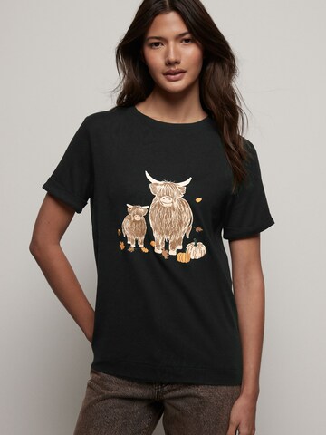 Next T-Shirt in Schwarz: Vorderseite