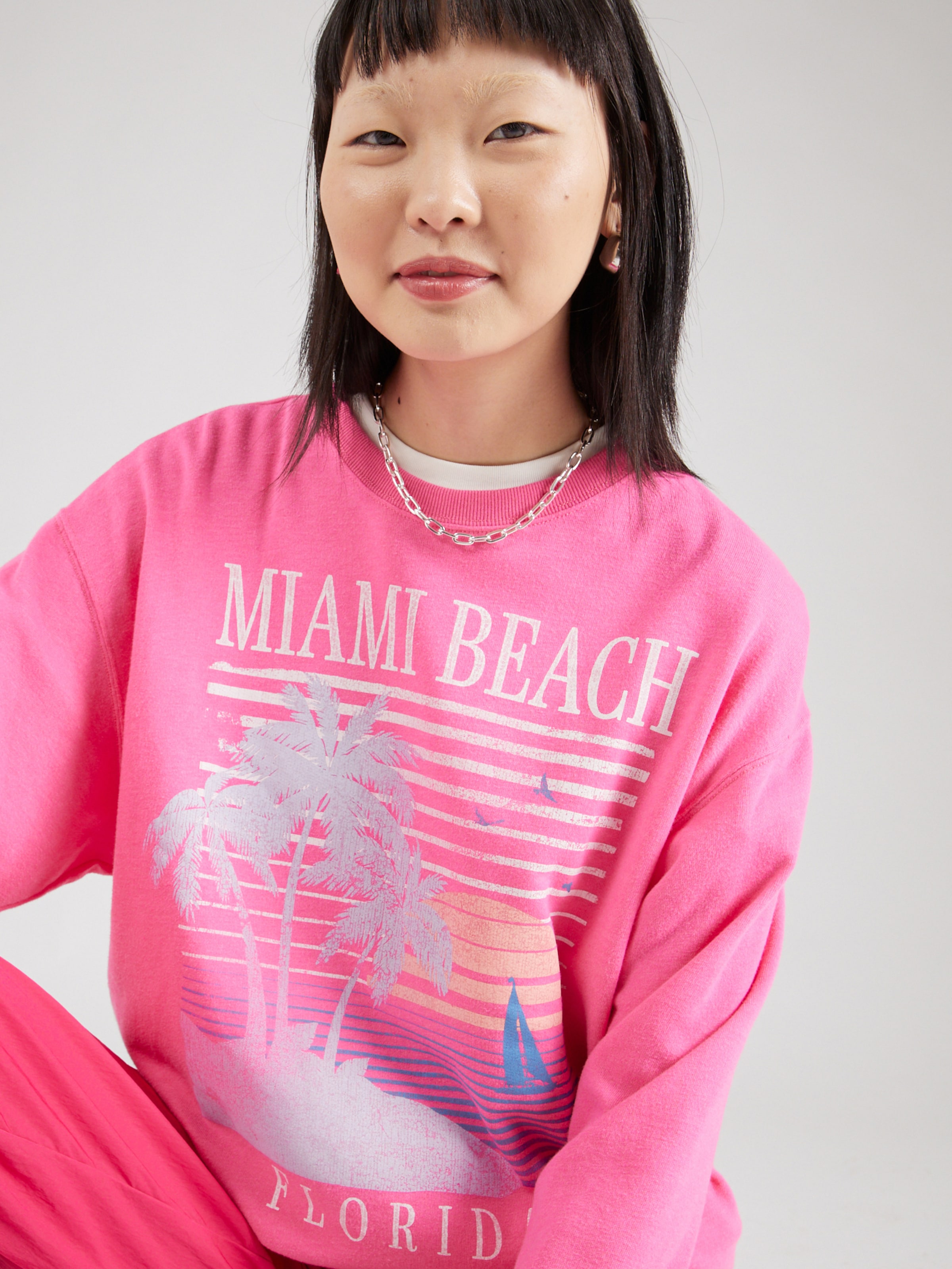 Pink hollister sweatshirt deals