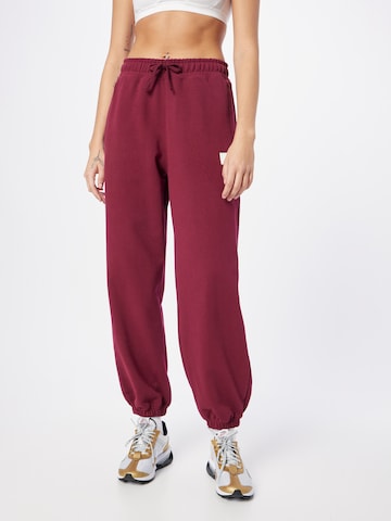 Jordan Tapered Trousers in Red: front