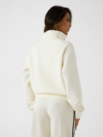 GUESS Athletic Zip-Up Hoodie in Beige