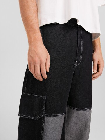 Loosefit Jeans cargo di Bershka in nero