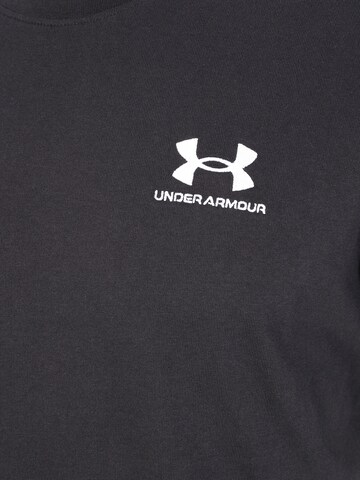 UNDER ARMOUR Koszulka funkcyjna w kolorze czarny