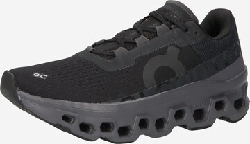 Scarpa da corsa 'Cloudmonster' di On in nero: frontale