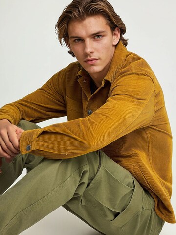 Loosefit Pantalon cargo Funky Buddha en vert