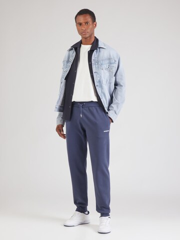 Effilé Pantalon Superdry en bleu