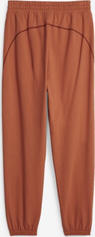 Effilé Pantalon de sport PUMA en marron