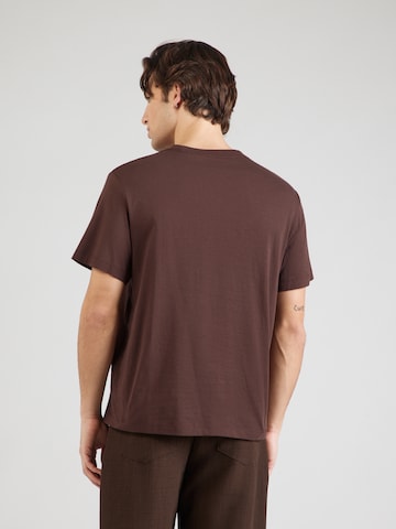 Calvin Klein Jeans Tričko 'NYC' – hnědá