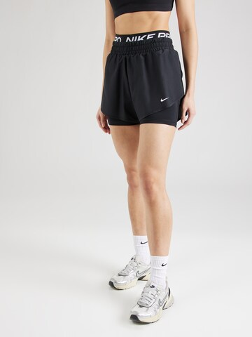 NIKE Regular Sports trousers in Black: front