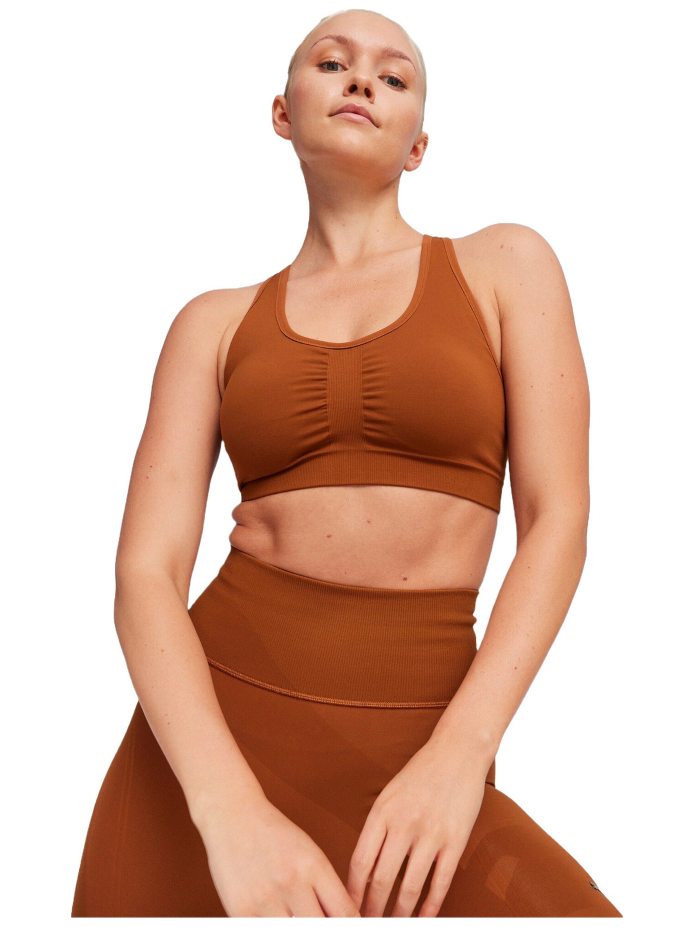 Top sportivo 'Puma 4keeps Shapeluxe Seamless Bra Teak' di PUMA in marrone