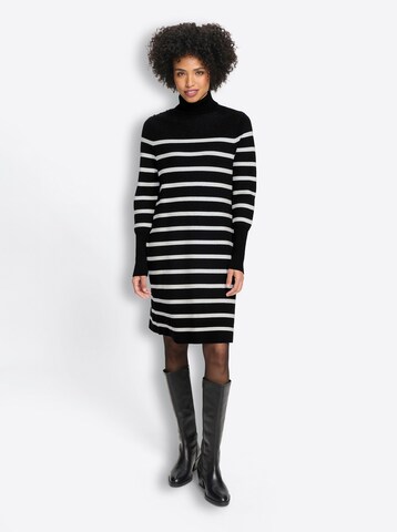 Rochie de la heine pe negru: față