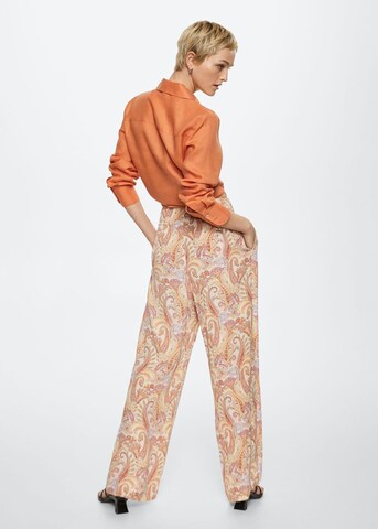 Wide leg Pantaloni 'Nora' de la MANGO pe portocaliu