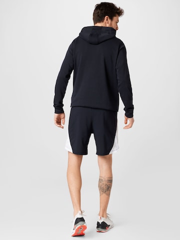 UNDER ARMOUR Regular Sportbyxa 'Launch' i svart