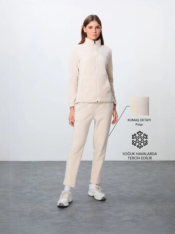Tommy Life Sweatsuit in Beige: front