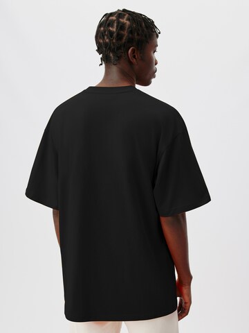 T-Shirt 'Aaron' ABOUT YOU x Kingsley Coman en noir