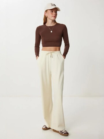 Wide leg Pantaloni di Happiness İstanbul in giallo