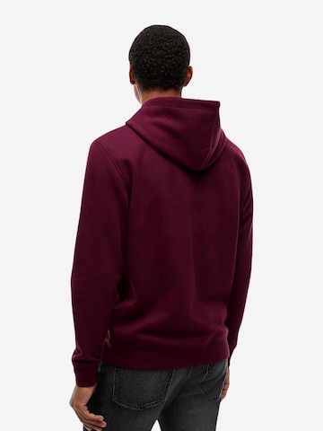 Sweat-shirt 'TJM REG LINEAR LOGO DM0DM20746' Tommy Jeans en rouge