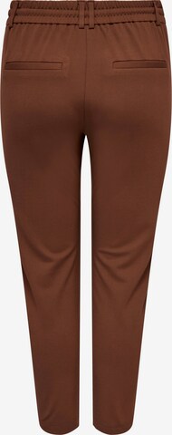 Regular Pantalon 'Goldtrash' ONLY Carmakoma en rouge