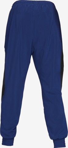 Effilé Pantalon de sport 'F.C. Joga Bonito 2.0' NIKE en bleu