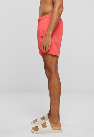 regular Pantaloni di Karl Kani in rosso