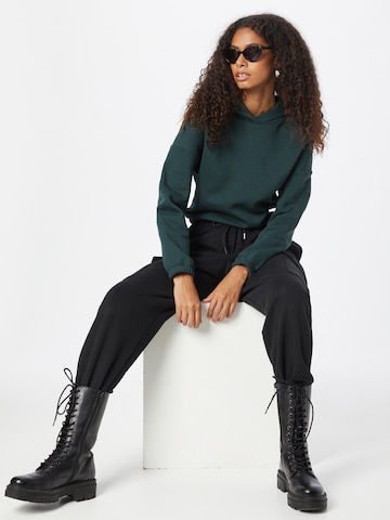 ABOUT YOU Sweatshirt 'Melisa' in Groen