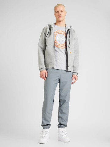 Veste de survêtement Carhartt WIP en gris