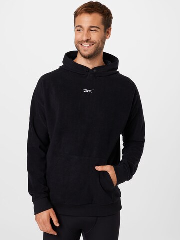 Sweat de sport Reebok en noir : devant