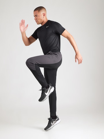 Nike Sportswear Tapered Trousers 'Tech Fleece' in Black