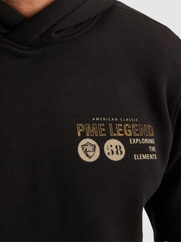 PME Legend Collegepaita 'Hoodie with artwork' värissä musta
