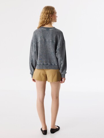 Sweat-shirt Twist en gris