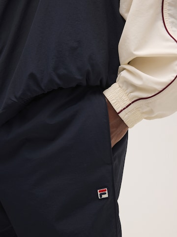 FILA - Loosefit Pantalón 'COLLALBO relaxed woven track pant' en azul