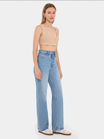 Top di Hiccup in marrone