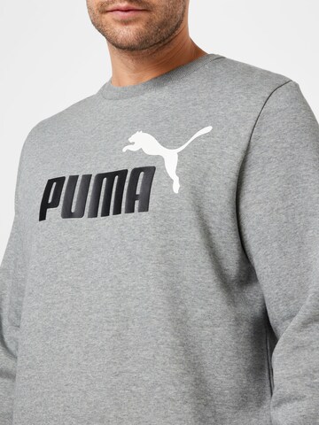 PUMA قميص رياضي بلون رمادي