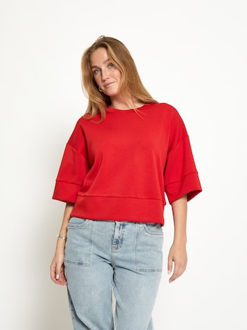 Peppercorn Sweatshirt 'Minnie' in Orange: front