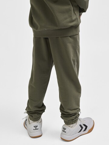 Effilé Pantalon 'TUKAS' Hummel en vert