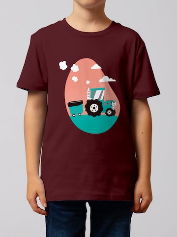 Maglietta 'Traktor' di watabout.kids in rosso: frontale
