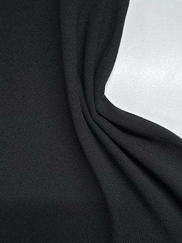 QWX2 - Camiseta 'GOD'S ARCHITECTURE' en negro