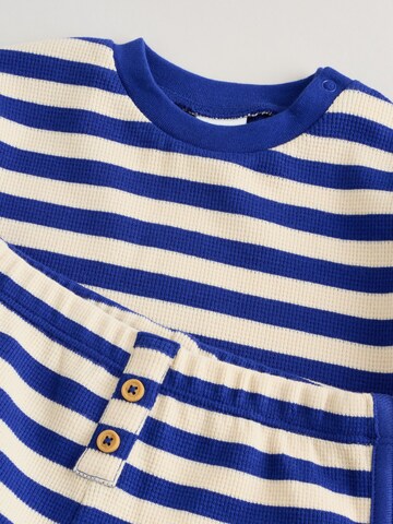 Set de la Next pe albastru