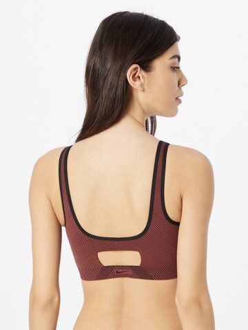 Bustier Soutien-gorge de sport 'INDY' NIKE en rouge