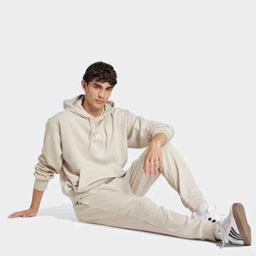 ADIDAS SPORTSWEAR Конический (Tapered) Спортивные штаны 'Feelcozy' в Бежевый