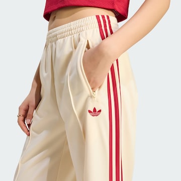 ADIDAS ORIGINALS Široký strih Nohavice 'Firebird' - Béžová
