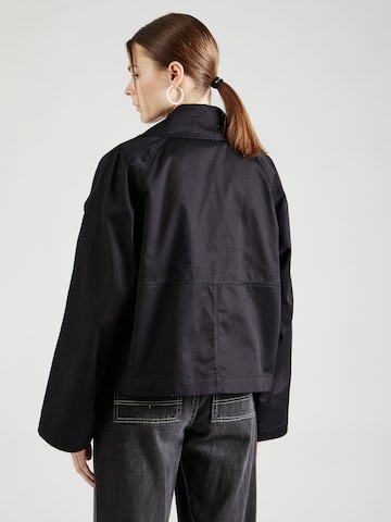 Manteau mi-saison Gina Tricot en noir