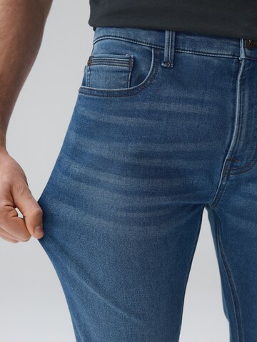 Next Slimfit Farmer 'Motion Flex' - kék