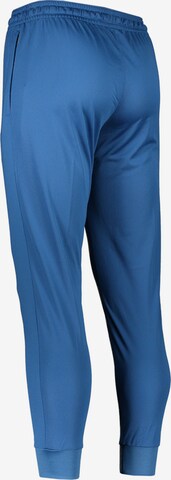 NIKE Tapered Workout Pants in Blue