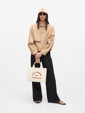 Plase de cumpărături ' MEDIUM RUE ST-GUILLAUME SQUARE PATCH ' de la Karl Lagerfeld pe bej: față